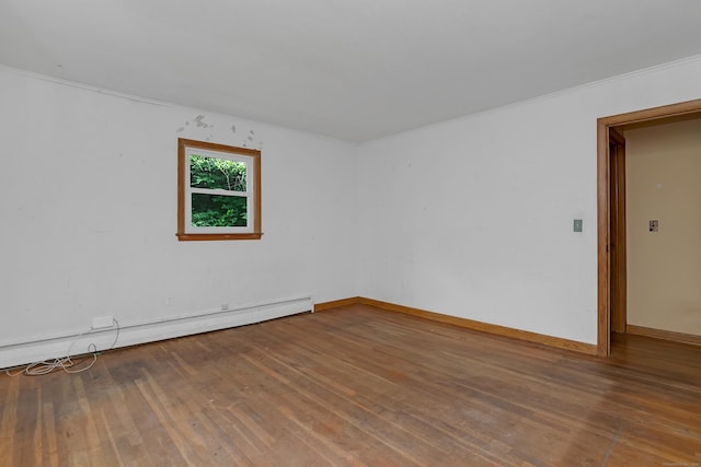 27 Tuttle Ct, Bethany, CT 06524 - spare room featuring a baseboard heating unit, wood finished floors, and crown molding