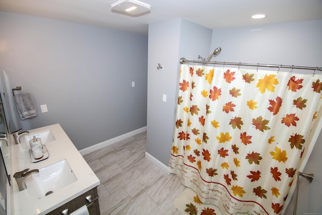625 Lakeview Rd, Orange, CT 06477 - bathroom with double vanity and curtained shower