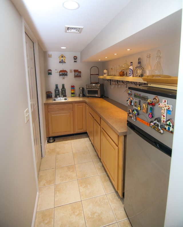 625 Lakeview Rd, Orange, CT 06477 - bar area with freestanding refrigerator, light tile patterned floors, and recessed lighting