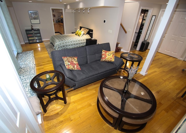 625 Lakeview Rd, Orange, CT 06477 - living area featuring light wood-style flooring and stairway
