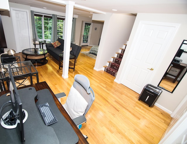625 Lakeview Rd, Orange, CT 06477 - exercise room featuring decorative columns and light wood-style flooring