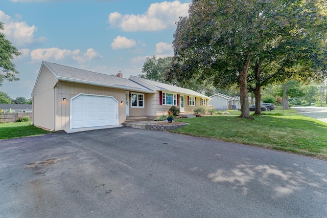 23 Sun St, Enfield, CT 06082 - ranch-style home featuring an attached garage, a chimney, a front lawn, and driveway