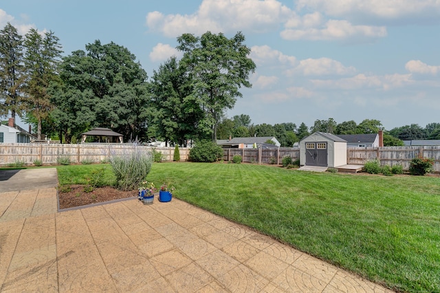 23 Sun St, Enfield, CT 06082 - fenced backyard with a shed, a patio, and a gazebo