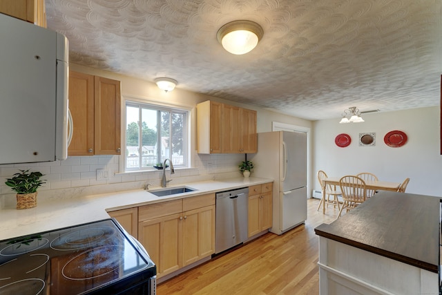 23 Sun St, Enfield, CT 06082 - kitchen featuring dishwasher, black electric range oven, backsplash, light wood finished floors, and freestanding refrigerator