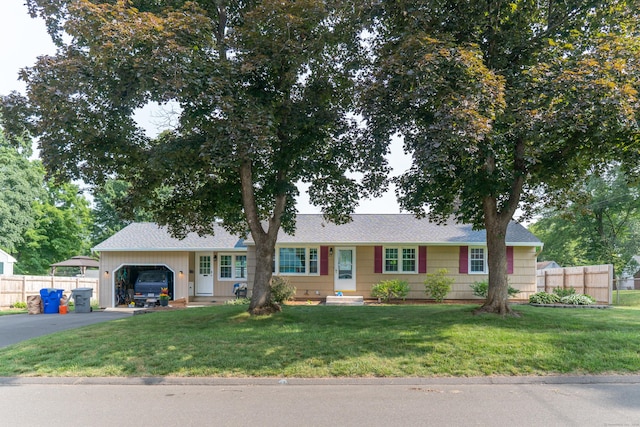 23 Sun St, Enfield, CT 06082 - ranch-style house featuring a garage, driveway, and a shingled roof