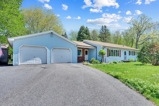 6 Victoria Dr, Colchester, CT 06415 - single story home featuring an attached garage, driveway, and a front lawn