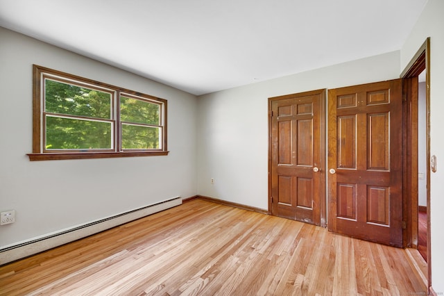 6 Victoria Dr, Colchester, CT 06415 - unfurnished bedroom with a baseboard radiator and light wood-type flooring