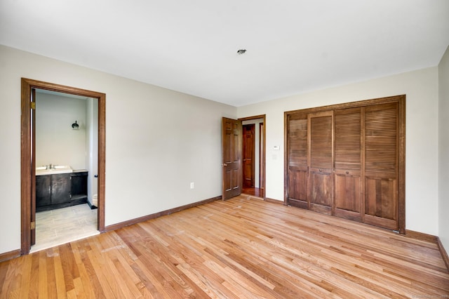 6 Victoria Dr, Colchester, CT 06415 - unfurnished bedroom featuring light wood-style floors, a closet, and ensuite bath