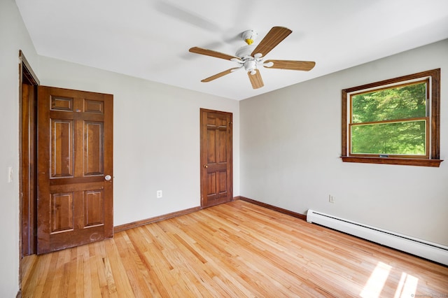 6 Victoria Dr, Colchester, CT 06415 - unfurnished bedroom featuring a baseboard radiator, light wood-type flooring, and ceiling fan