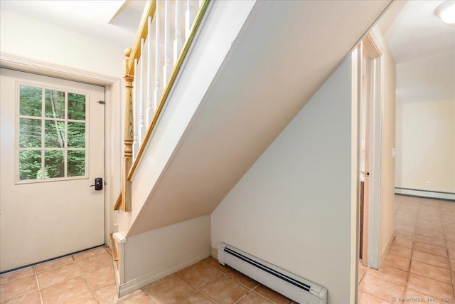 135 Green Pond Rd, Sherman, CT 06784 - bonus room featuring a baseboard radiator, lofted ceiling, light tile patterned floors, and stairway