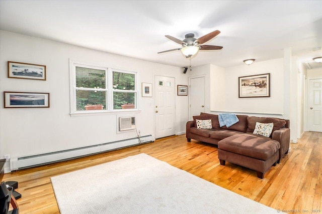 135 Green Pond Rd, Sherman, CT 06784 - living area featuring a baseboard heating unit, wood finished floors, and a ceiling fan