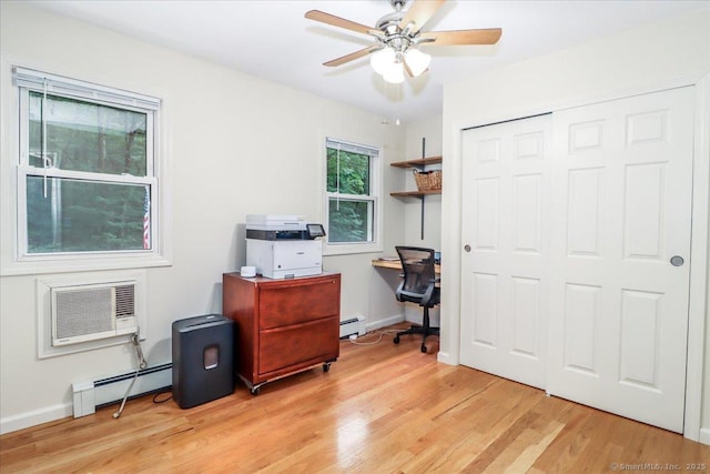 135 Green Pond Rd, Sherman, CT 06784 - office with a baseboard heating unit, a wall unit AC, and light wood-style floors