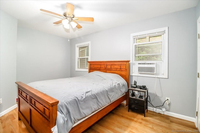 135 Green Pond Rd, Sherman, CT 06784 - bedroom featuring light wood-style flooring, a ceiling fan, and cooling unit