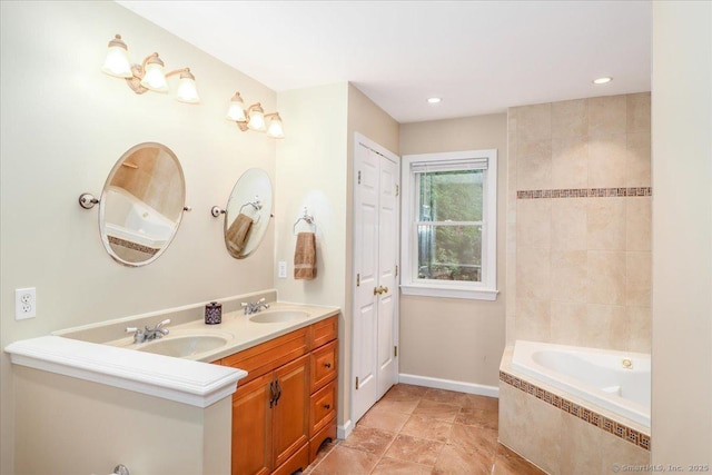 135 Green Pond Rd, Sherman, CT 06784 - bathroom with tiled tub, double vanity, and recessed lighting