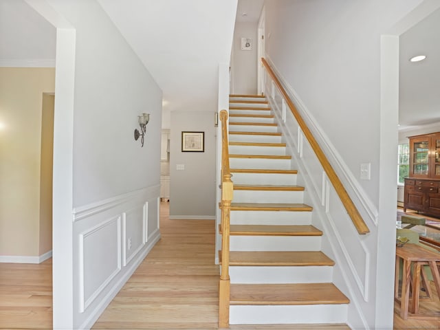 22 Rocky Ridge Dr, Trumbull, CT 06611 - staircase with wood finished floors, a wainscoted wall, and recessed lighting