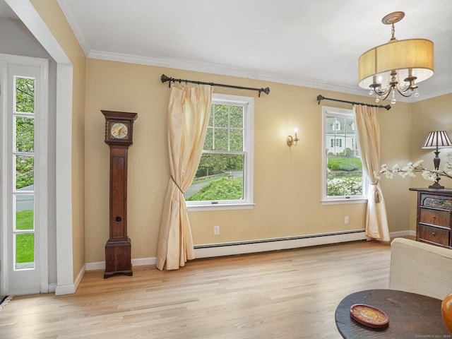22 Rocky Ridge Dr, Trumbull, CT 06611 - living area with a baseboard radiator, crown molding, light wood-style flooring, and a chandelier