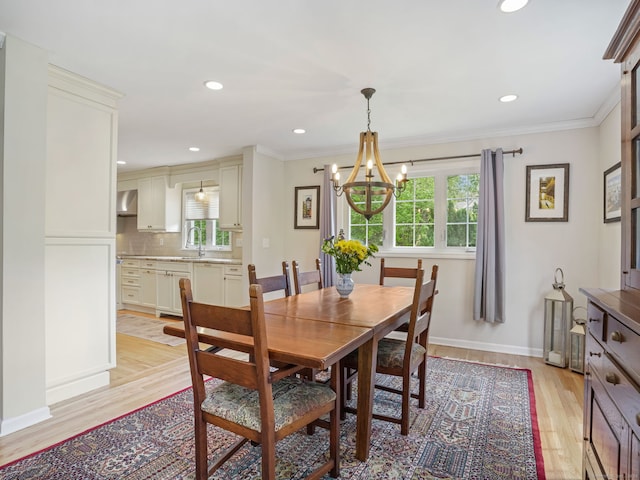 22 Rocky Ridge Dr, Trumbull, CT 06611 - dining room with light wood-style floors, a chandelier, ornamental molding, and recessed lighting