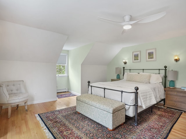 22 Rocky Ridge Dr, Trumbull, CT 06611 - bedroom with a baseboard radiator, wood finished floors, lofted ceiling, and ceiling fan