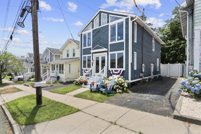 35 Lawrence Ave, Milford, CT 06460 - view of front facade featuring asphalt driveway, a residential view, and entry steps