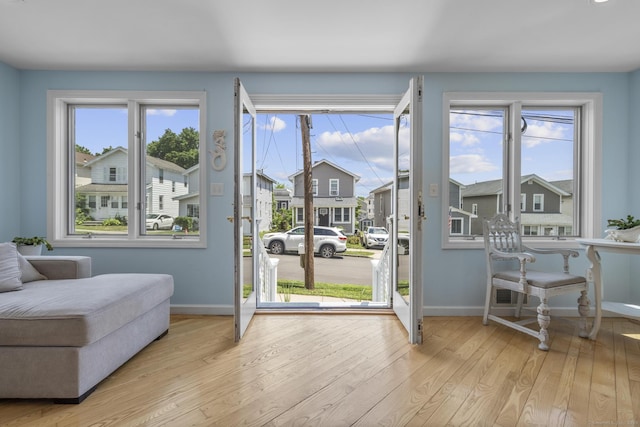 35 Lawrence Ave, Milford, CT 06460 - doorway to outside with wood finished floors and a residential view