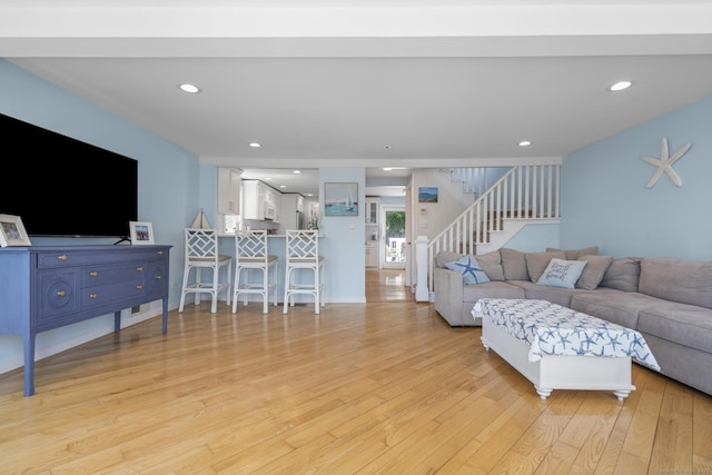 35 Lawrence Ave, Milford, CT 06460 - living room featuring light wood-style flooring, stairway, and recessed lighting