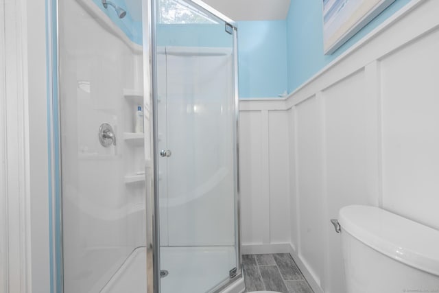 35 Lawrence Ave, Milford, CT 06460 - full bathroom with a stall shower, a decorative wall, and a wainscoted wall