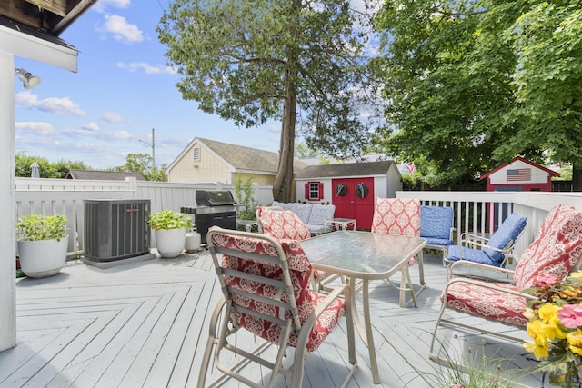 35 Lawrence Ave, Milford, CT 06460 - deck with a storage unit and outdoor dining area