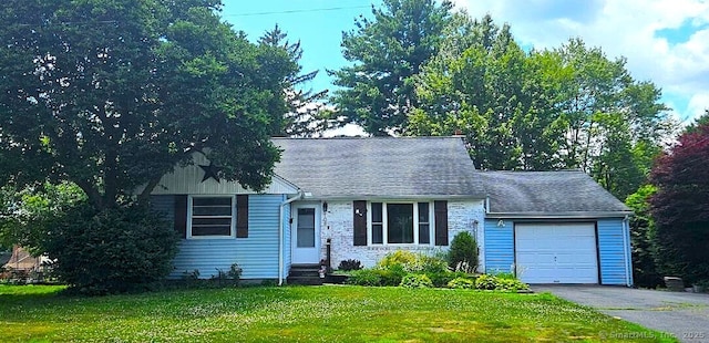 108 French St, Bristol, CT 06010 - view of front of house featuring entry steps, a garage, driveway, and a front yard