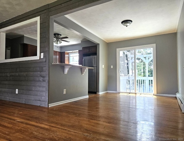 108 French St, Bristol, CT 06010 - unfurnished living room with ornamental molding, wood finished floors, and ceiling fan