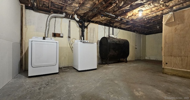 108 French St, Bristol, CT 06010 - unfinished basement featuring oil tank and independent washer and dryer