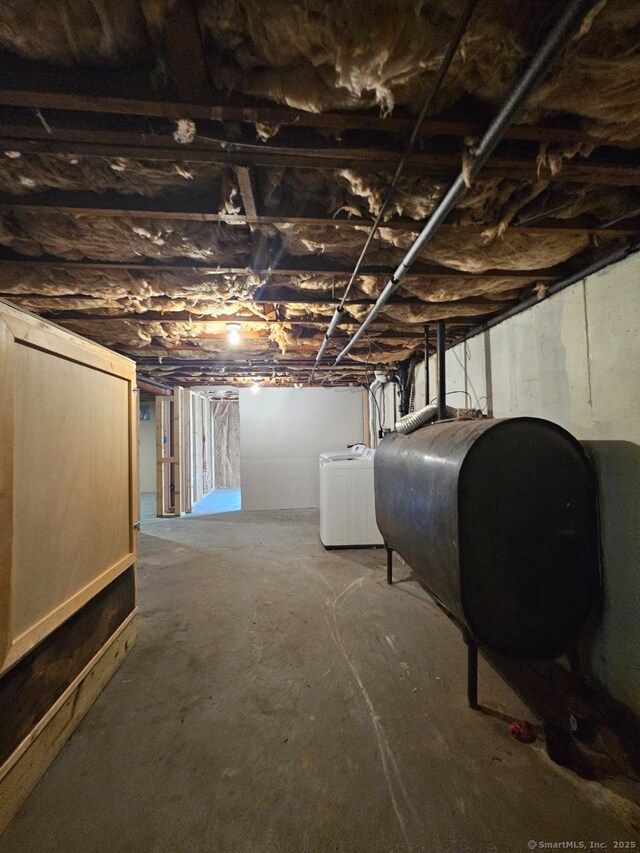 108 French St, Bristol, CT 06010 - unfinished below grade area featuring oil tank and washer / clothes dryer