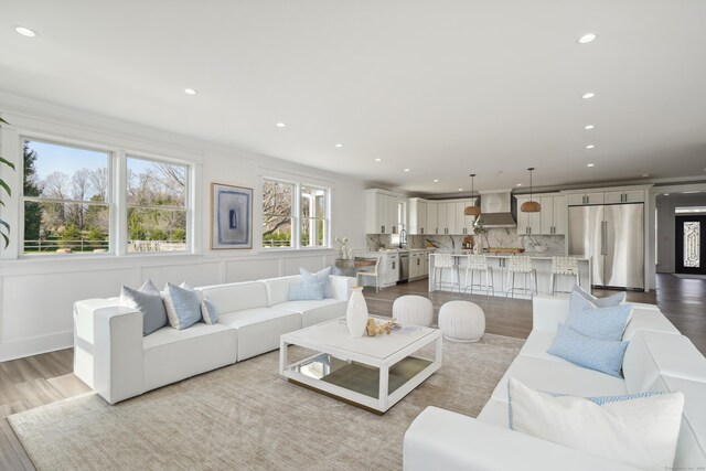 433 Belden Hill Rd, Wilton, CT 06897 - living area with wood finished floors and recessed lighting