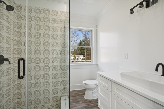 433 Belden Hill Rd, Wilton, CT 06897 - full bathroom with ornamental molding, vanity, wood finished floors, and a shower stall