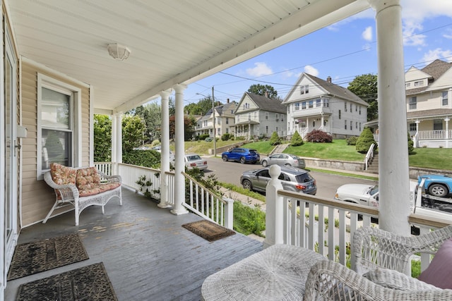 269 Olivia St, Derby, CT 06418 - wooden porch with a residential view