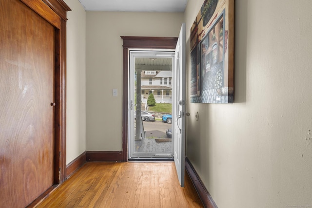 269 Olivia St, Derby, CT 06418 - doorway to outside featuring light wood-style flooring and baseboards