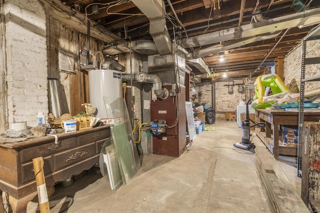 269 Olivia St, Derby, CT 06418 - unfinished below grade area featuring water heater, heating unit, and washer / dryer