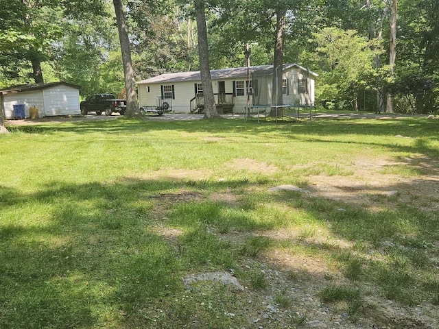 27 August Dr, Brooklyn, CT 06234 - view of grassy yard with an outbuilding