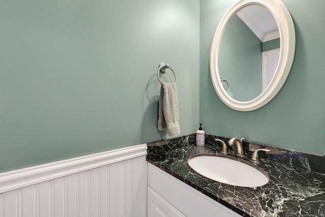 668 Kings Hwy W Unit 668, Fairfield, CT 06890 - bathroom with vanity, ornamental molding, and wainscoting
