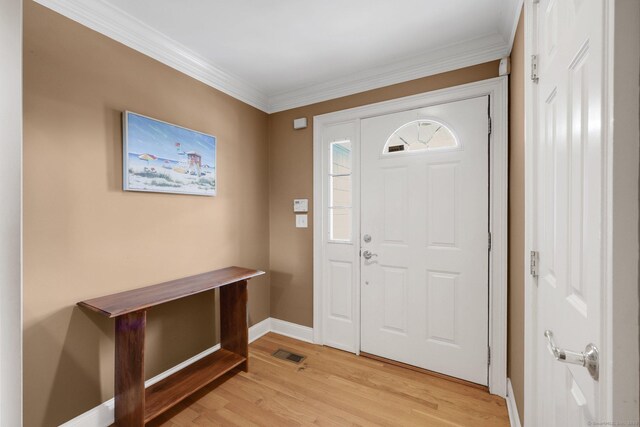 668 Kings Hwy W Unit 668, Fairfield, CT 06890 - entrance foyer featuring light wood-style floors and crown molding