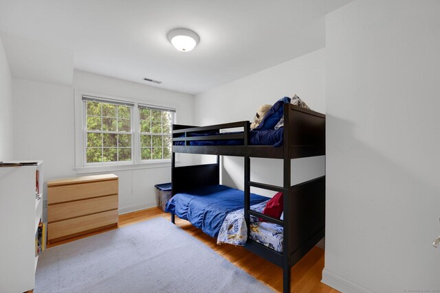 668 Kings Hwy W Unit 668, Fairfield, CT 06890 - bedroom featuring wood finished floors