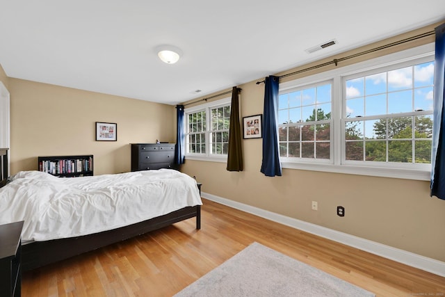 668 Kings Hwy W Unit 668, Fairfield, CT 06890 - bedroom with baseboards and wood finished floors