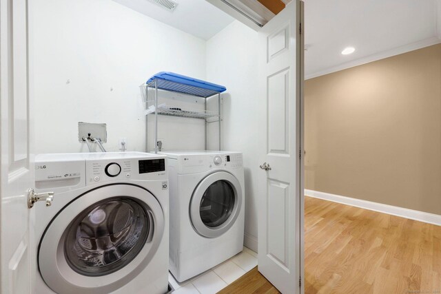 668 Kings Hwy W Unit 668, Fairfield, CT 06890 - washroom featuring independent washer and dryer, light wood-style flooring, crown molding, and recessed lighting