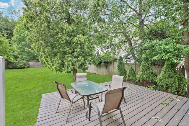 668 Kings Hwy W Unit 668, Fairfield, CT 06890 - wooden terrace with outdoor dining space and a fenced backyard