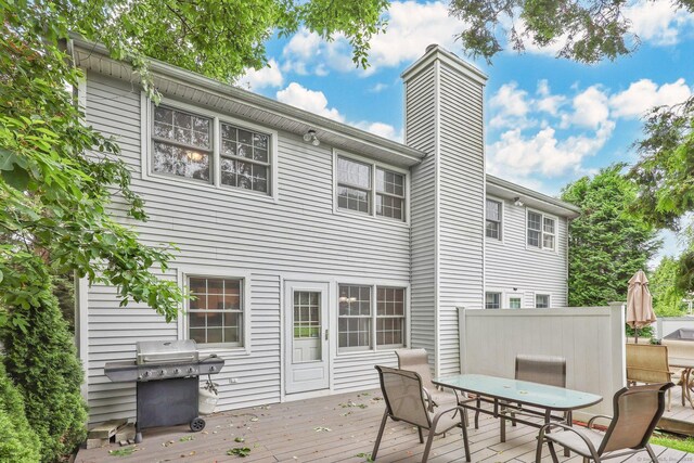 668 Kings Hwy W Unit 668, Fairfield, CT 06890 - wooden deck with area for grilling and outdoor dining space