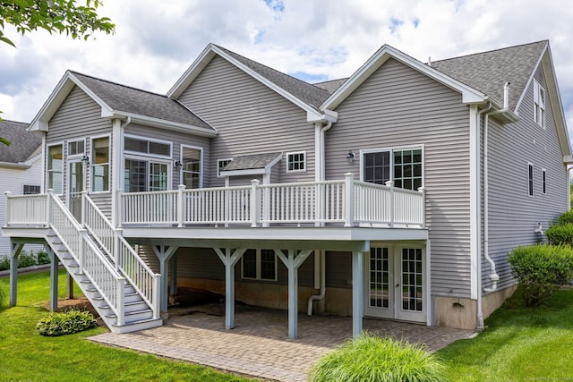 20 Stony Creek Rd Unit 20, Southington, CT 06479 - rear view of house featuring a shingled roof, a patio, french doors, and a wooden deck