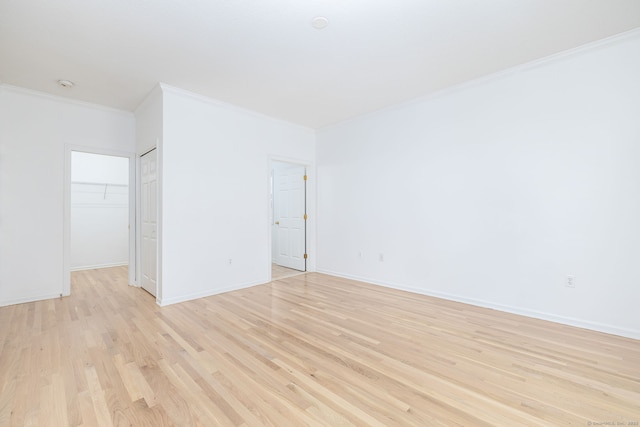 20 Stony Creek Rd Unit 20, Southington, CT 06479 - empty room featuring crown molding, light wood-style flooring, and a smoke detector