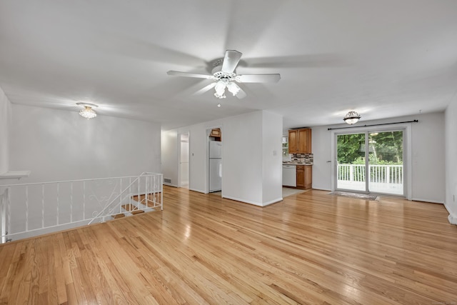 43 Kanter Dr, Vernon, CT 06066 - unfurnished living room with light wood-style floors and a ceiling fan