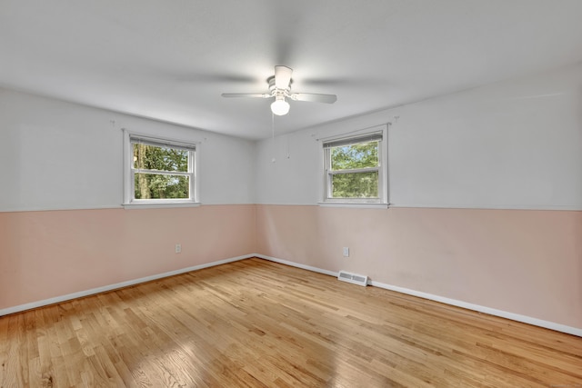 43 Kanter Dr, Vernon, CT 06066 - empty room with plenty of natural light, wood finished floors, and a ceiling fan