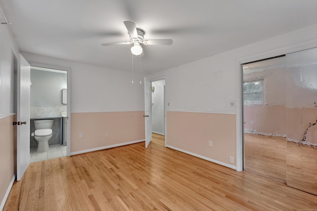 43 Kanter Dr, Vernon, CT 06066 - unfurnished bedroom featuring light wood-style floors, ensuite bathroom, and ceiling fan