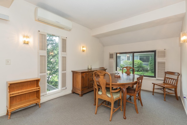 512 Heritage Vlg Unit B, Southbury, CT 06488 - dining area with a wall mounted AC, plenty of natural light, lofted ceiling, and light colored carpet
